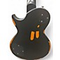 Used Vintage V100MRBK Black Over Sunburst Solid Body Electric Guitar thumbnail