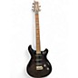 Used 2010 PRS 25th Anniversary 305 Black Solid Body Electric Guitar thumbnail