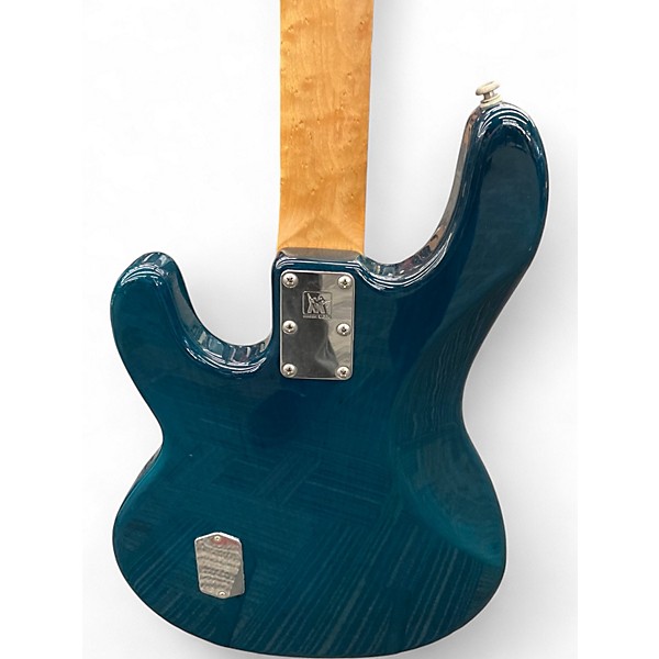 Used Ernie Ball Music Man Stingray 4 H TRANSLUCENT TEAL Electric Bass Guitar