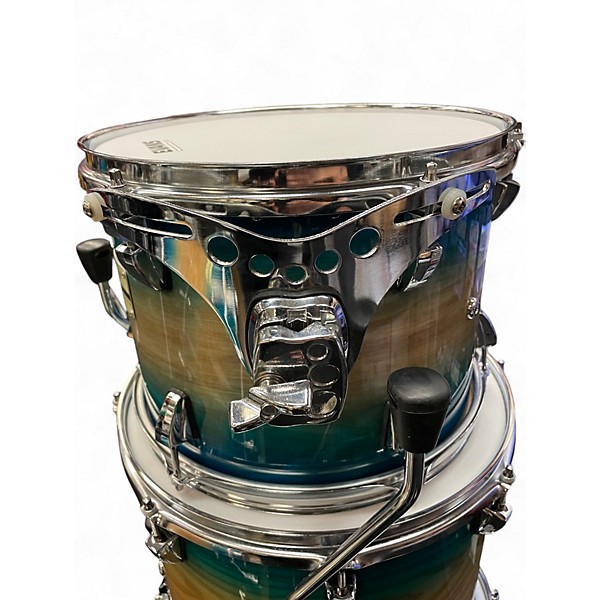 Used Odery 4 Piece Fluence Fusion Blue Burst over Ash Drum Kit