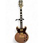 Used D'Angelico Deluxe Brighton Matte Rose Gold Solid Body Electric Guitar thumbnail