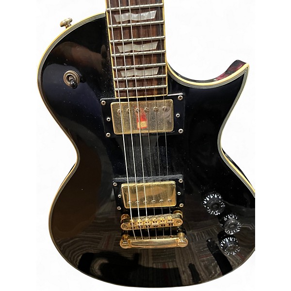 Used ESP LTD EC1000 Black and Gold Solid Body Electric Guitar
