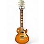 Used 2018 Gibson Les Paul Tribute Honey Burst Solid Body Electric Guitar thumbnail