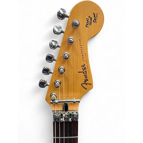 Vintage 1994 Fender Squier Series HSS Stratocaster with Floyd Blue Fotoflame Solid Body Electric Guitar