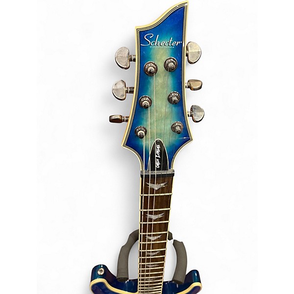 Used 2020s Schecter Guitar Research Omen Extreme 6 Ocean Blue Burst Solid Body Electric Guitar