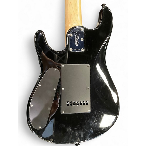 Used Sterling by Music Man John Petrucci JP157 7 String Emerald Green Solid Body Electric Guitar