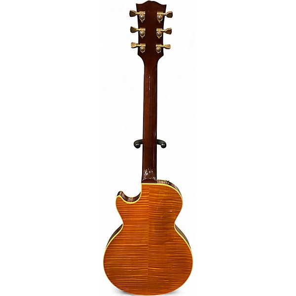 Used 2007 Gibson Les Paul Supreme Trans Amber Solid Body Electric Guitar