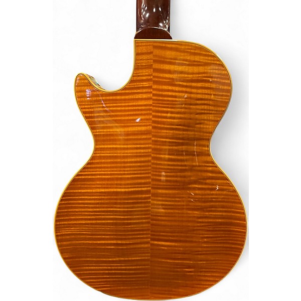 Used 2007 Gibson Les Paul Supreme Trans Amber Solid Body Electric Guitar