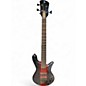 Used Spector Bantam 4 Black and Red Metallic Flake Electric Bass Guitar thumbnail