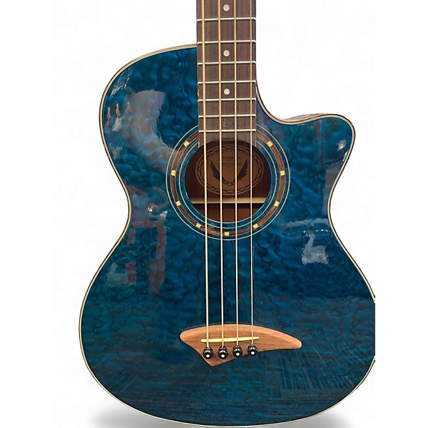 Used Dean Exotica Quilted Ash 4-String Trans Blue Acoustic Bass Guitar