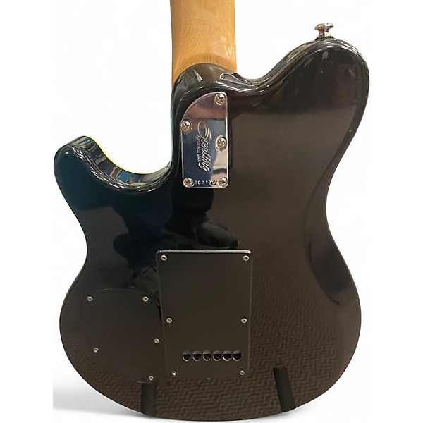 Used Sterling by Music Man ax30 Orange Solid Body Electric Guitar