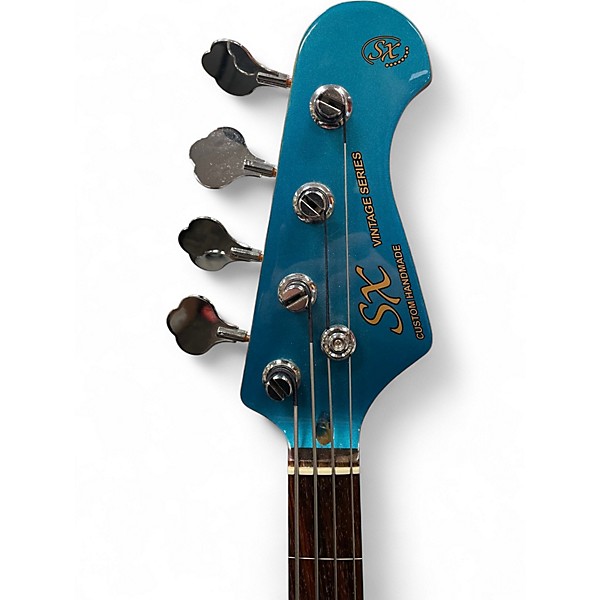 Used SX VTG FRETLESS Metallic Blue Electric Bass Guitar