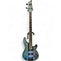 Used Schecter Guitar Research C-4 GT Trans Teal Electric Bass Guitar thumbnail