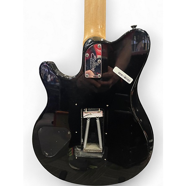 Used Sterling by Music Man AX40 Trans Gold Solid Body Electric Guitar