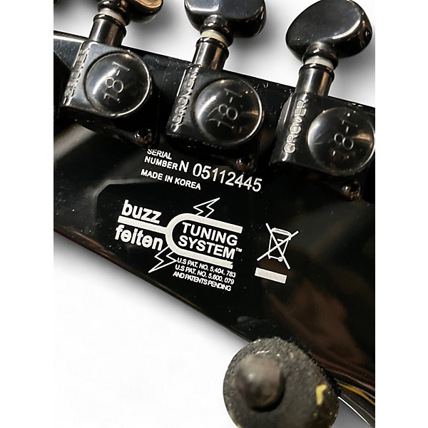 Used 2005 Washburn Ace Frehley F40V Black and Silver Solid Body Electric Guitar