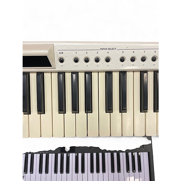 Used Roland AX 7 Synthesizer