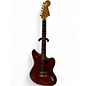 Used 2012 Fender Modern Player Jaguar Red Transparent Solid Body Electric Guitar thumbnail