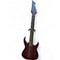 Used 2024 Agile SCEPTOR PRO 727 TRIBAL RED Solid Body Electric Guitar thumbnail