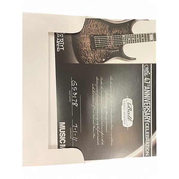 Used Ernie Ball Music Man GC 47th Anniversary JPX Signature Trans Black Solid Body Electric Guitar