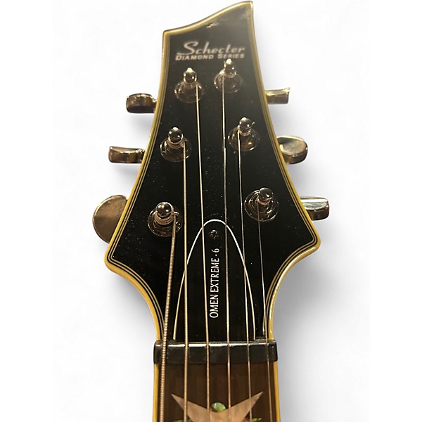 Used Schecter Guitar Research Omen Extreme 6 See Through Black Solid Body Electric Guitar