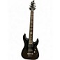 Used 2010s Schecter Guitar Research Damien Elite 7 Metallic Black Solid Body Electric Guitar thumbnail