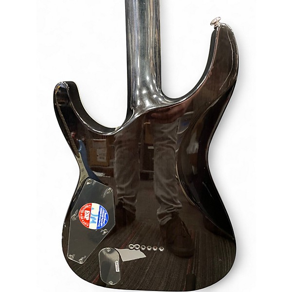 Used ESP LTD MH1001 Deluxe Trans Black Solid Body Electric Guitar