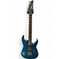 Used 1996 Ibanez RG517 Blue Sparkle Solid Body Electric Guitar thumbnail
