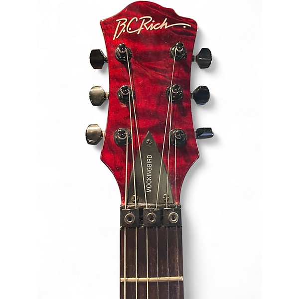 Used B.C. Rich Mockingbird STC Trans Red Solid Body Electric Guitar