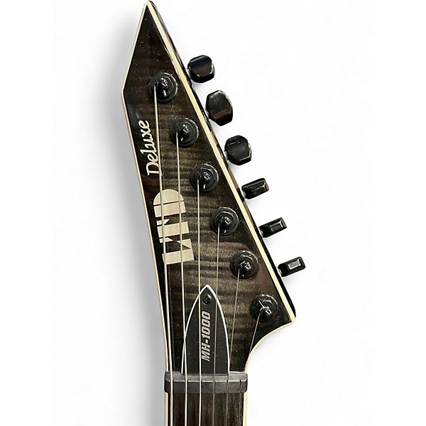Used ESP LTD MH1000 Deluxe Trans Charcoal Solid Body Electric Guitar