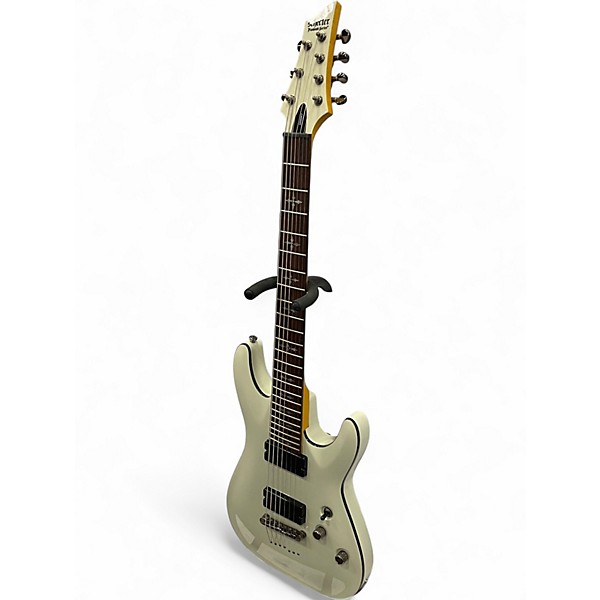 Used 2021 Schecter Guitar Research Demon 7 String Vintage White Solid Body Electric Guitar
