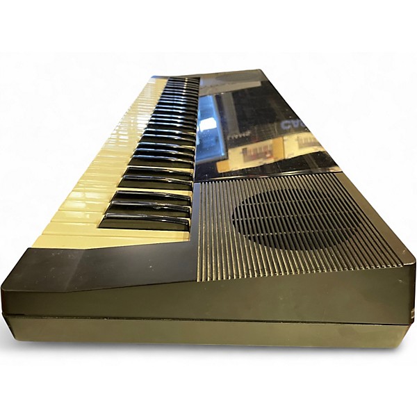 Used Lowrey Micro Genie V-125 Portable Keyboard