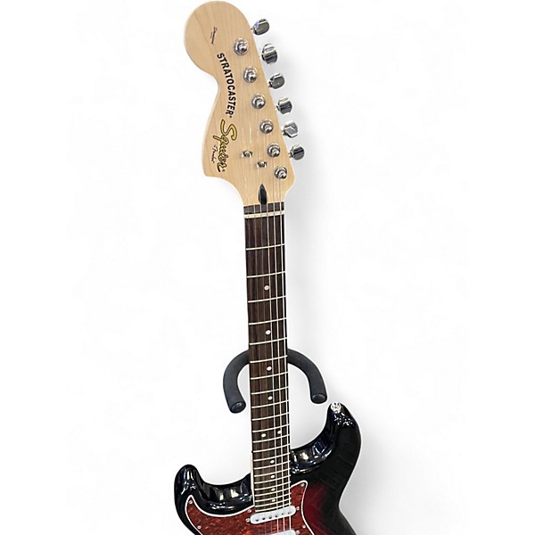 Used Squier Standard Stratocaster Left Handed Trans Red Electric Guitar