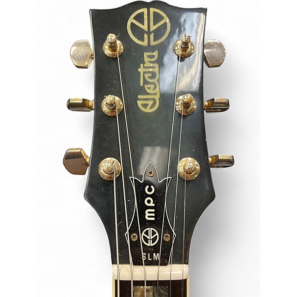 Vintage 1976 Electra X310 Black and Gold Solid Body Electric Guitar