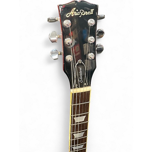Used Aria Pro Ii LS600 Standard Cherry Sunburst Solid Body Electric Guitar