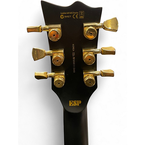 Used ESP LTD EC1000 Deluxe Black and Gold Solid Body Electric Guitar