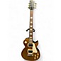 Used 2016 Gibson Les Paul Tribute Gold Top Solid Body Electric Guitar thumbnail
