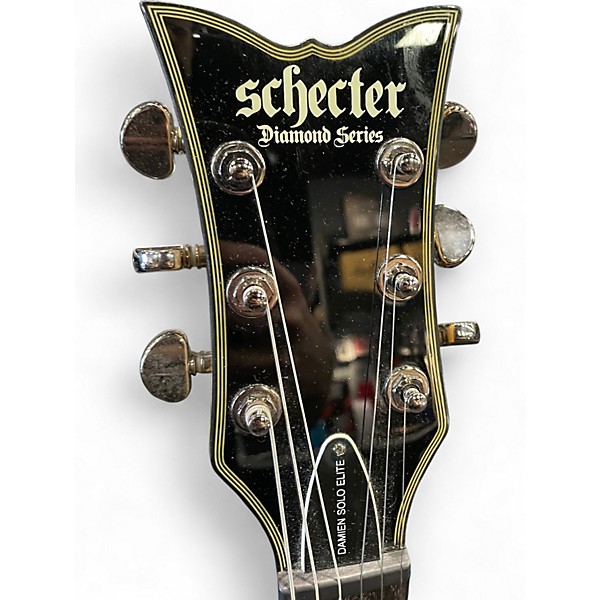 Used Schecter Guitar Research Damien Elite Solo Transparent Red Solid Body Electric Guitar