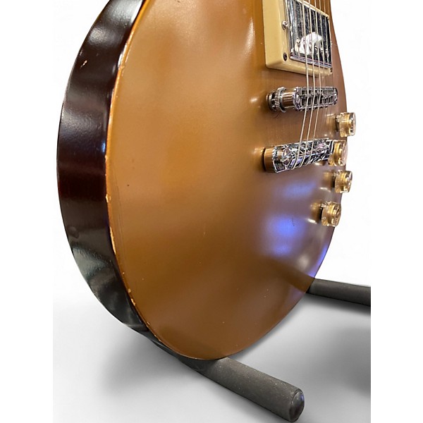 Used Gibson Les Paul Tribute Gold Top Solid Body Electric Guitar