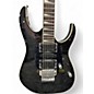 Used Ibanez RG4EX1 Trans Black Solid Body Electric Guitar thumbnail