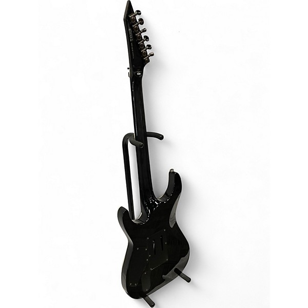 Used 2014 ESP LTD MH1000 Trans Black Solid Body Electric Guitar