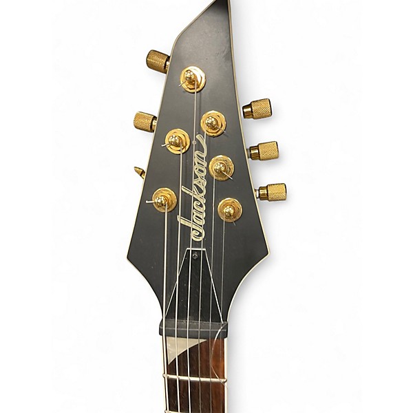 Used Jackson Monarkh X SERIES Black and Gold Solid Body Electric Guitar