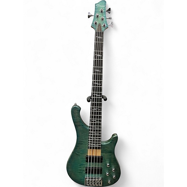 Used Caraya RHYTHMIC SYMPHONY TRANS TURQUOISE Electric Bass Guitar