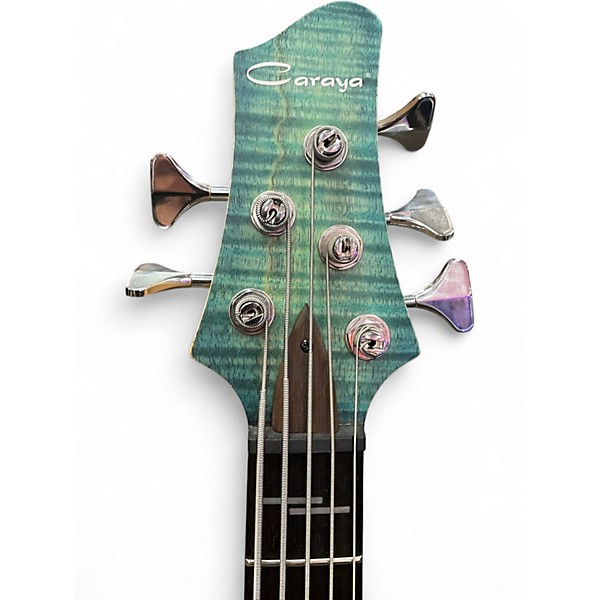 Used Caraya RHYTHMIC SYMPHONY TRANS TURQUOISE Electric Bass Guitar