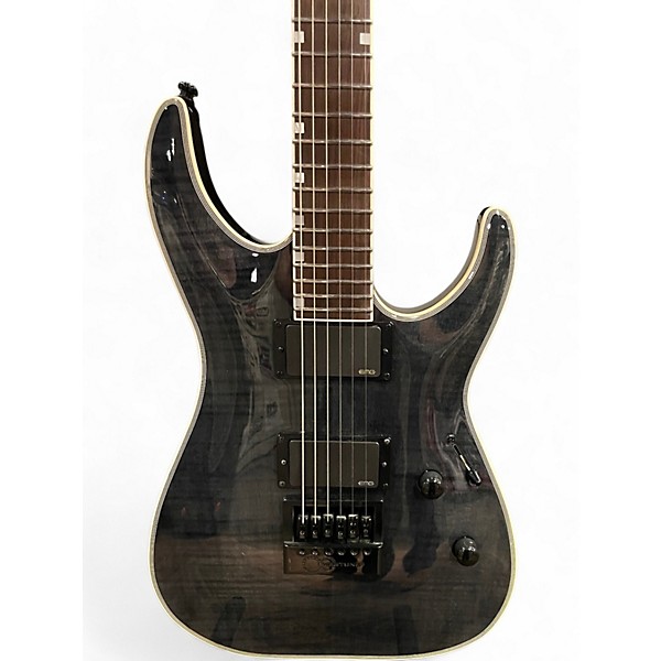 Used ESP LTD MH1000 Deluxe Trans Black Solid Body Electric Guitar