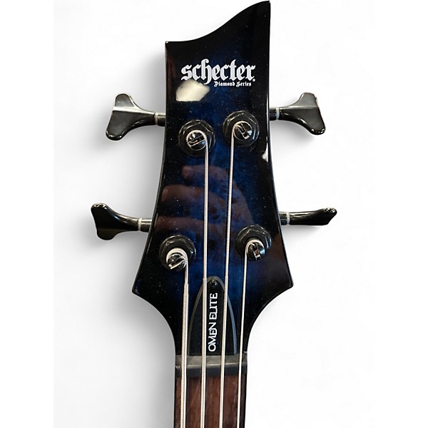 Used Schecter Guitar Research Omen Extreme 4 String See-Thru Blue Burst Electric Bass Guitar
