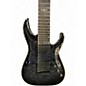 Used Schecter Guitar Research Hellraiser C8 Hybrid Trans Black Solid Body Electric Guitar thumbnail