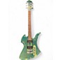 Used 1990s B.C. Rich Mockingbird Acrylic Green Acrylic Solid Body Electric Guitar thumbnail