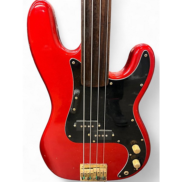 Used Harmony Discovery D68MR Fretless Metallic Red Electric Bass Guitar