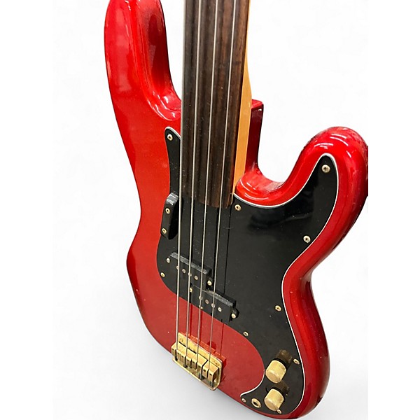 Used Harmony Discovery D68MR Fretless Metallic Red Electric Bass Guitar