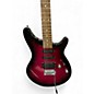 Used Rogue Rocketeer Plum Solid Body Electric Guitar